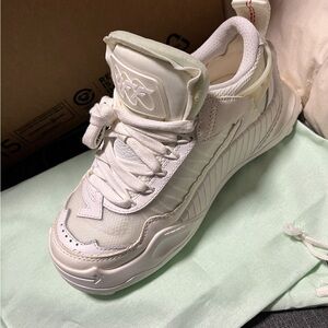 Off white sneakers and original packaging with original bag never worn